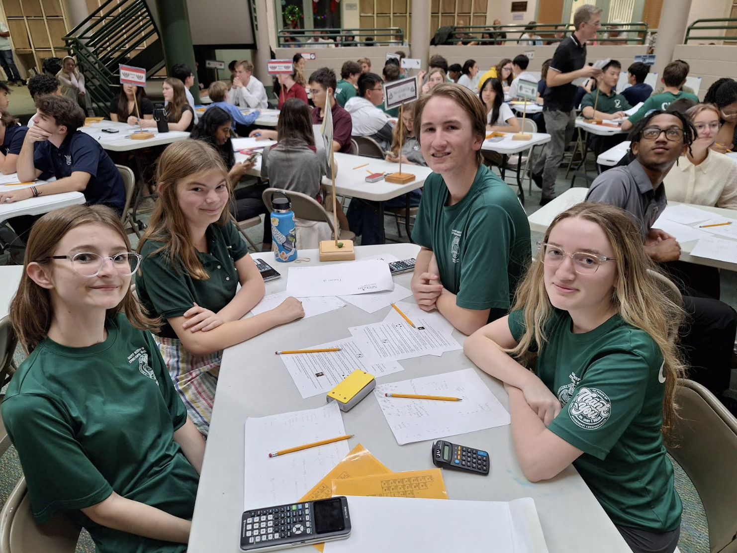 Members Grace Baxendale, Nadia Grubbs, Lark Rippy, Pearson Walters working together. 